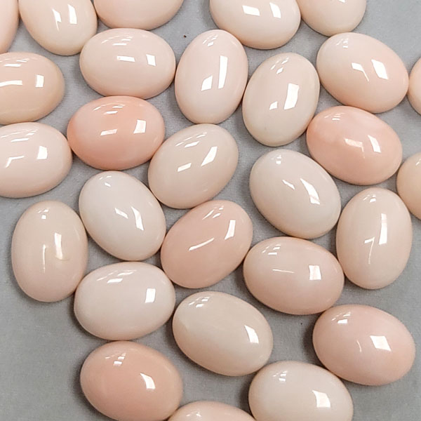 12X16MM OVAL CABOCHON  NATURAL ANGLE SKIN CORAL